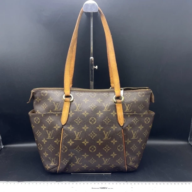 95新 LouisVuitton/路易威登 奶瓶单肩包/13800