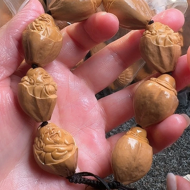 橄榄核吊坠橄榄包衣财神
