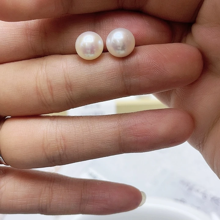 淡水珍珠耳饰银S925镶嵌来****?