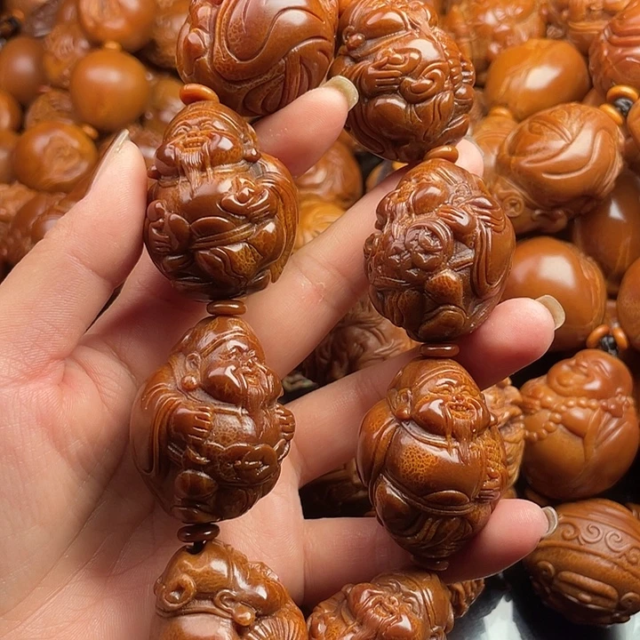 个***扬橄榄核吊坠橄榄核手持