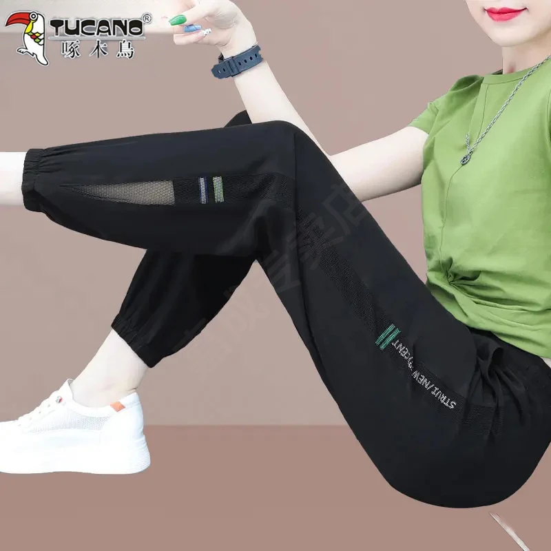 啄木鸟2025夏天新款冰丝裤运动速干女薄款时髦百搭九分裤母亲装