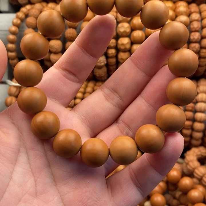 哈***喽微瑕泛油二等正圆光珠