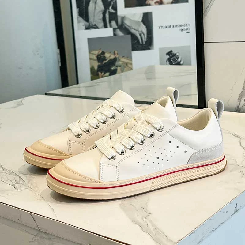 夏季新款男鞋小白鞋真皮打孔透气时尚运动休闲平底潮鞋软面板鞋
