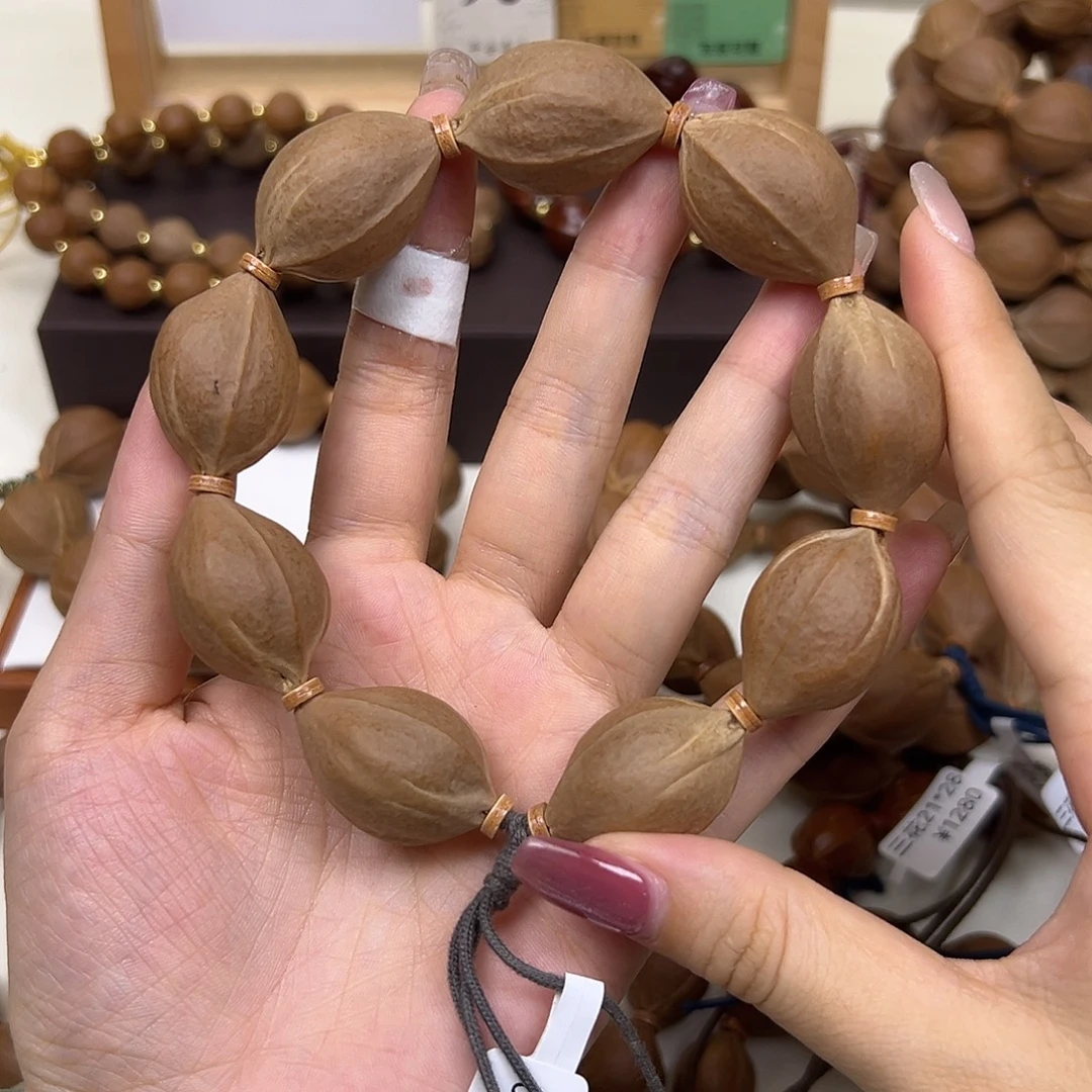 `***τ手串/手链橄榄核三花21.30