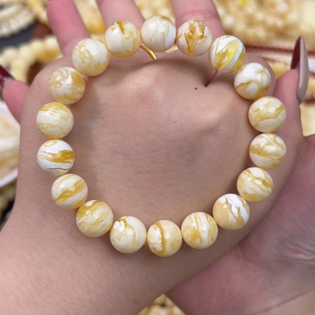 哇***呜琥珀未镶嵌手串金瓷漆白虎皮11.2