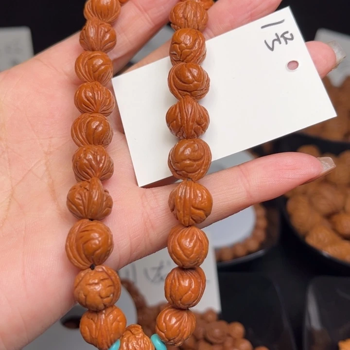 吊坠桃核玉龙脊12左右手持