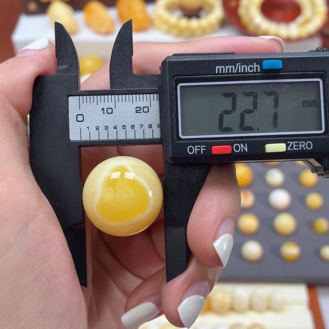 琥珀未镶嵌裸石焦皮拉丝眼睛溶洞22.7mm