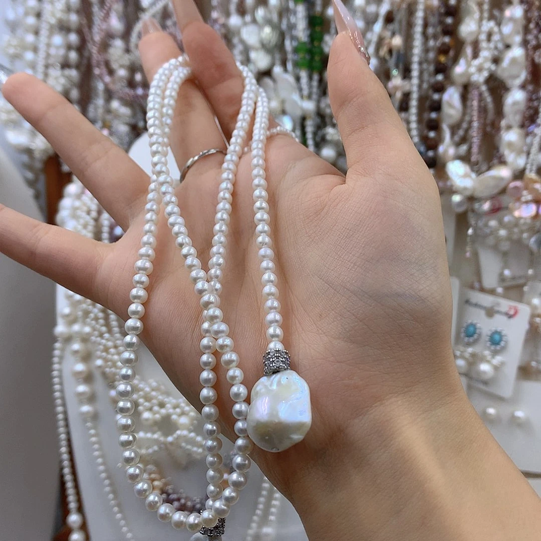 彩****淡水珍珠银S925镶嵌项链耳饰