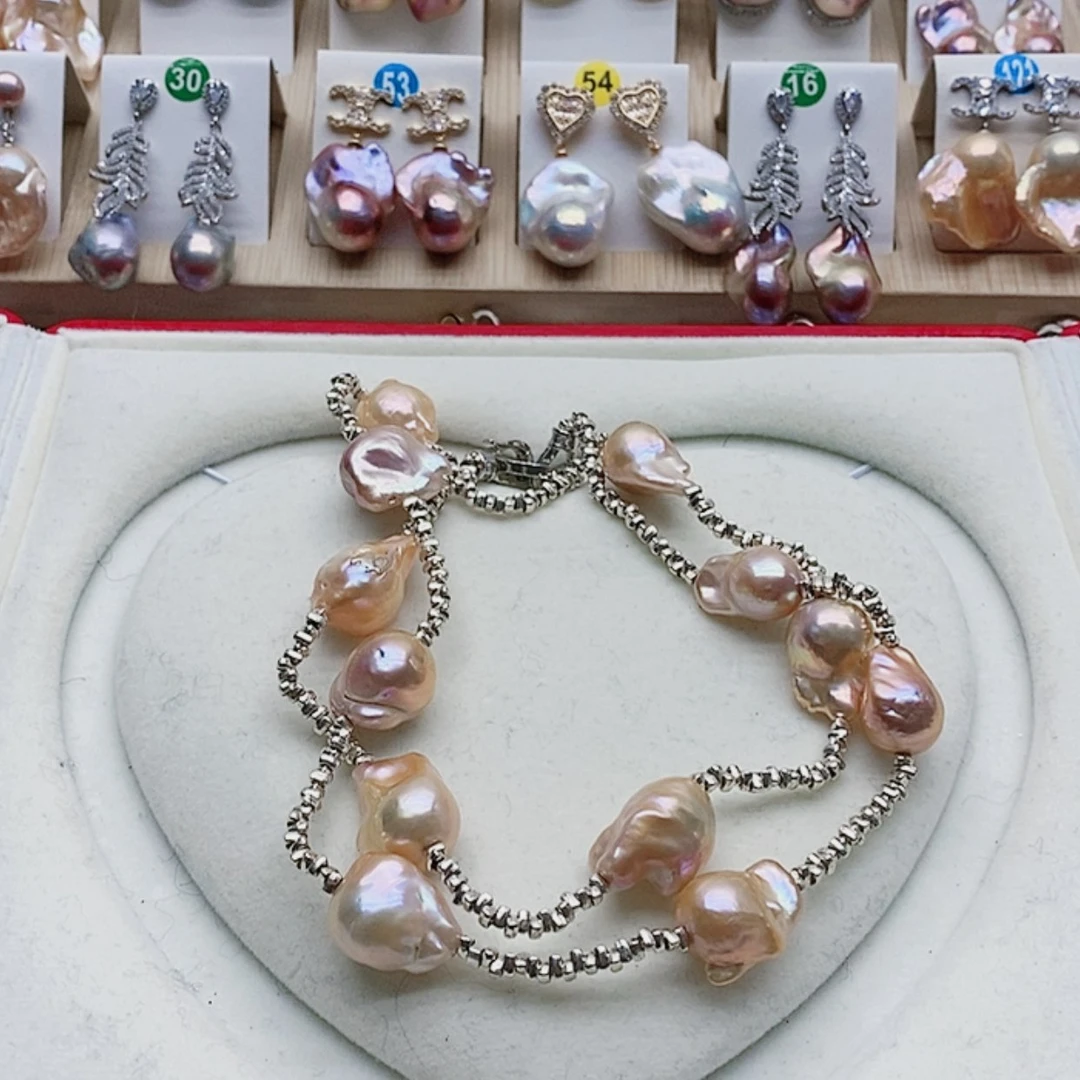 【闪购商品】淡水珍珠耳饰银S925镶嵌阿**猪