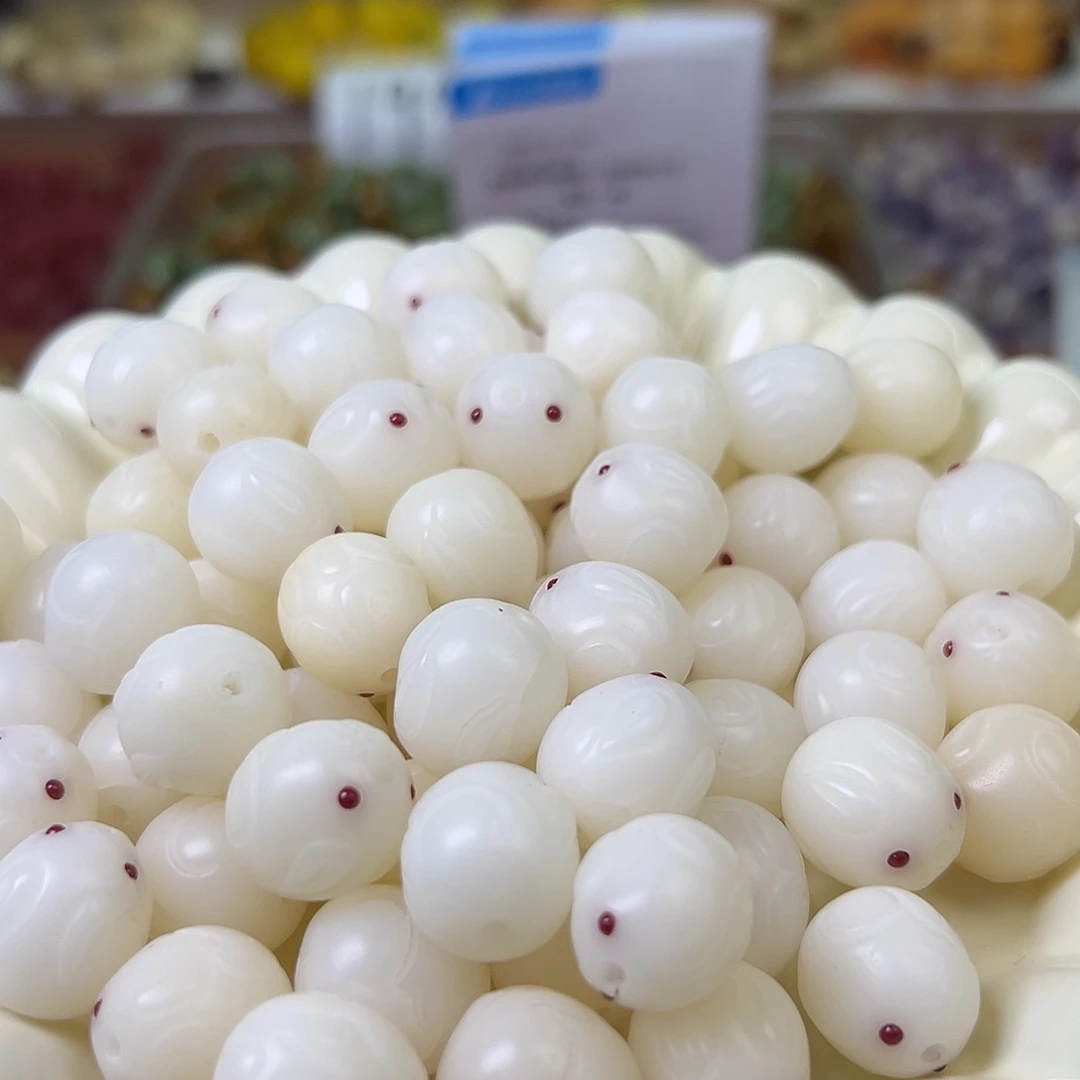 菩提根/象牙果手串瑕疵卡15紫眼睛兔子25颗有裂