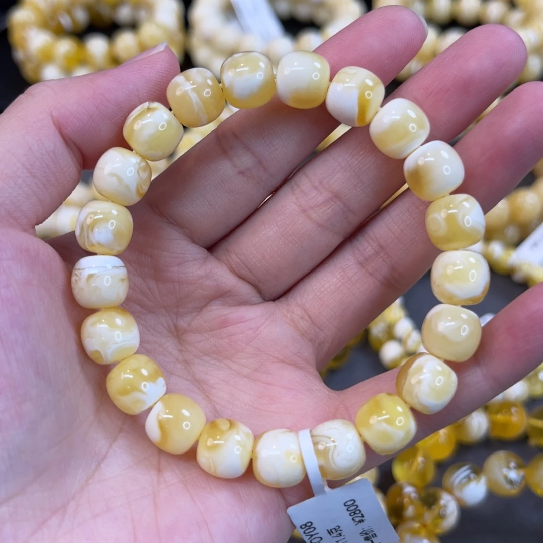 蜜蜡未镶嵌手串9.5*9mm金瓷白妖花