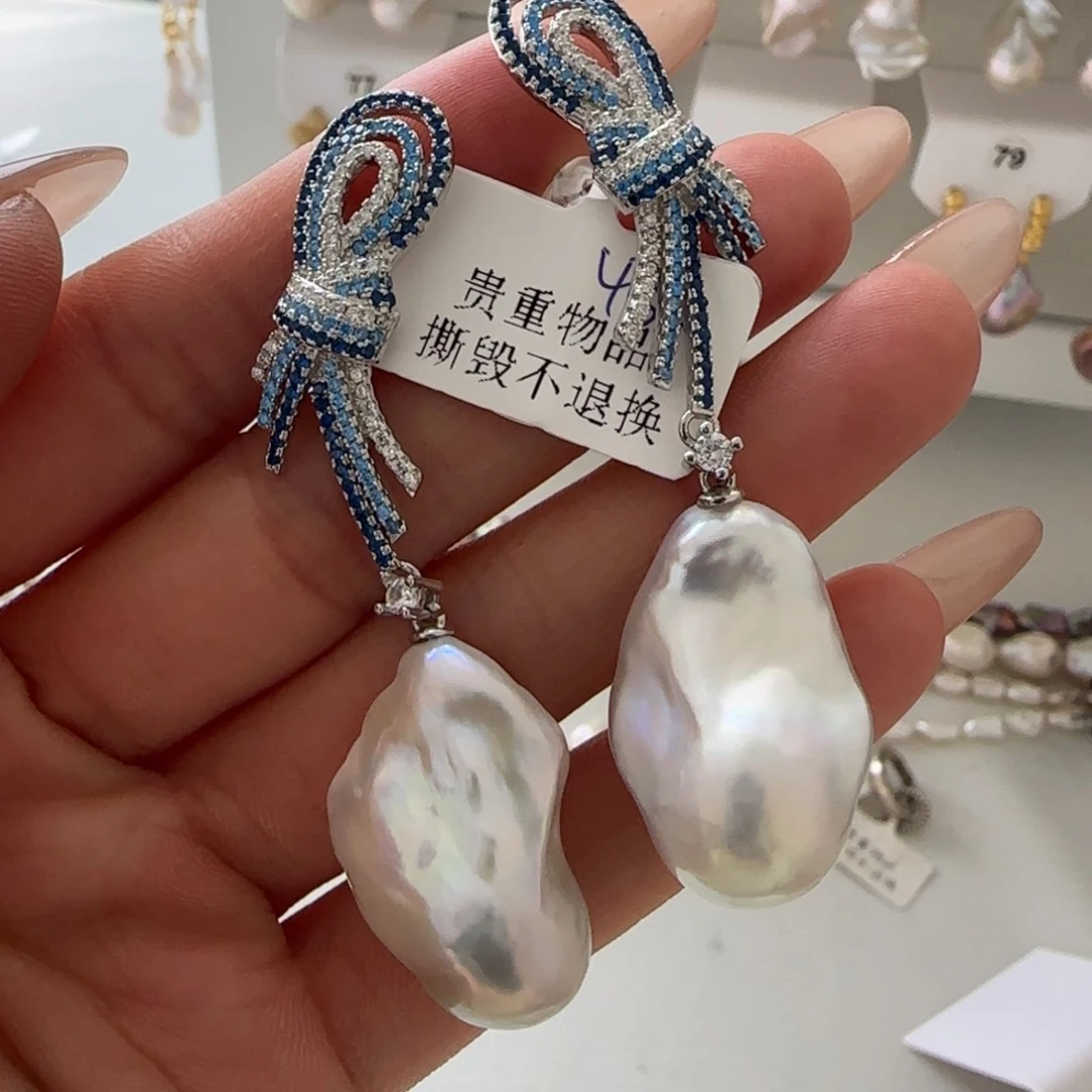 淡水珍珠耳饰银S925镶嵌泰****?