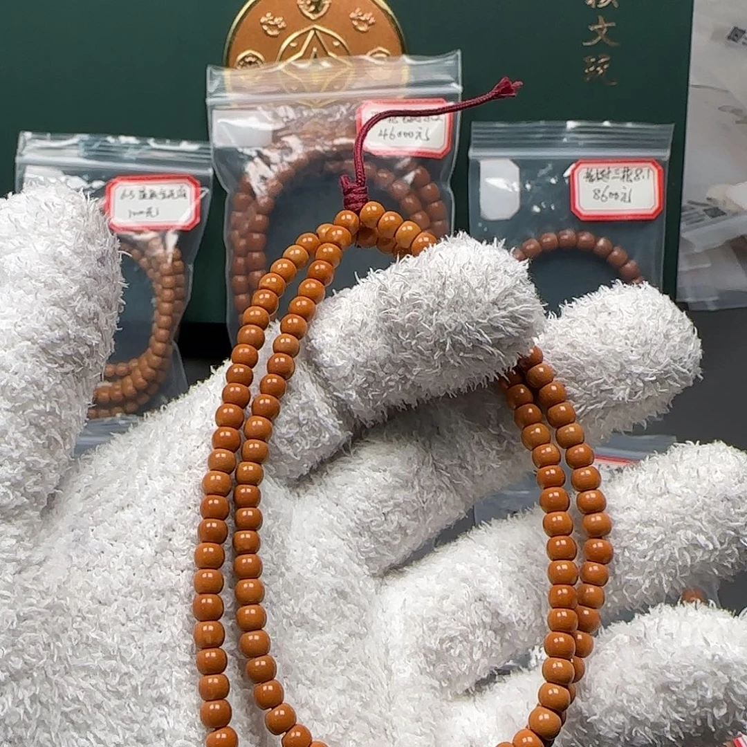 橄榄核吊坠5.1mm老挝核尖长串福利款微白