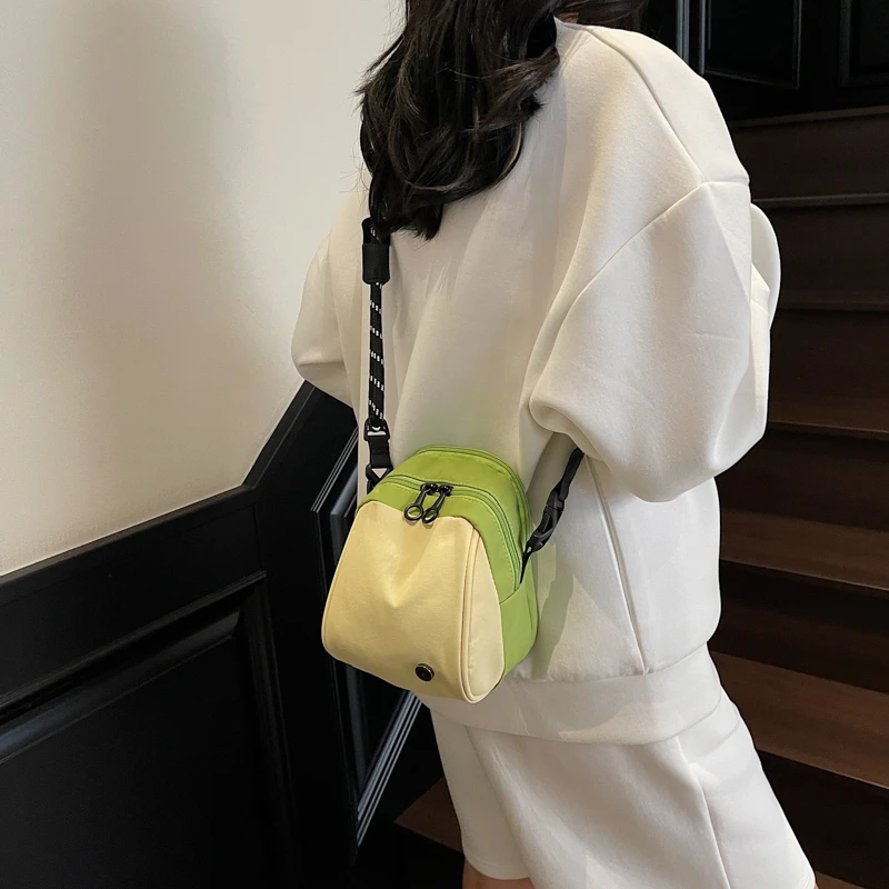 秋冬新款时尚潮流轻便百搭便携零钱包贝壳手拿包单肩斜挎包包女款