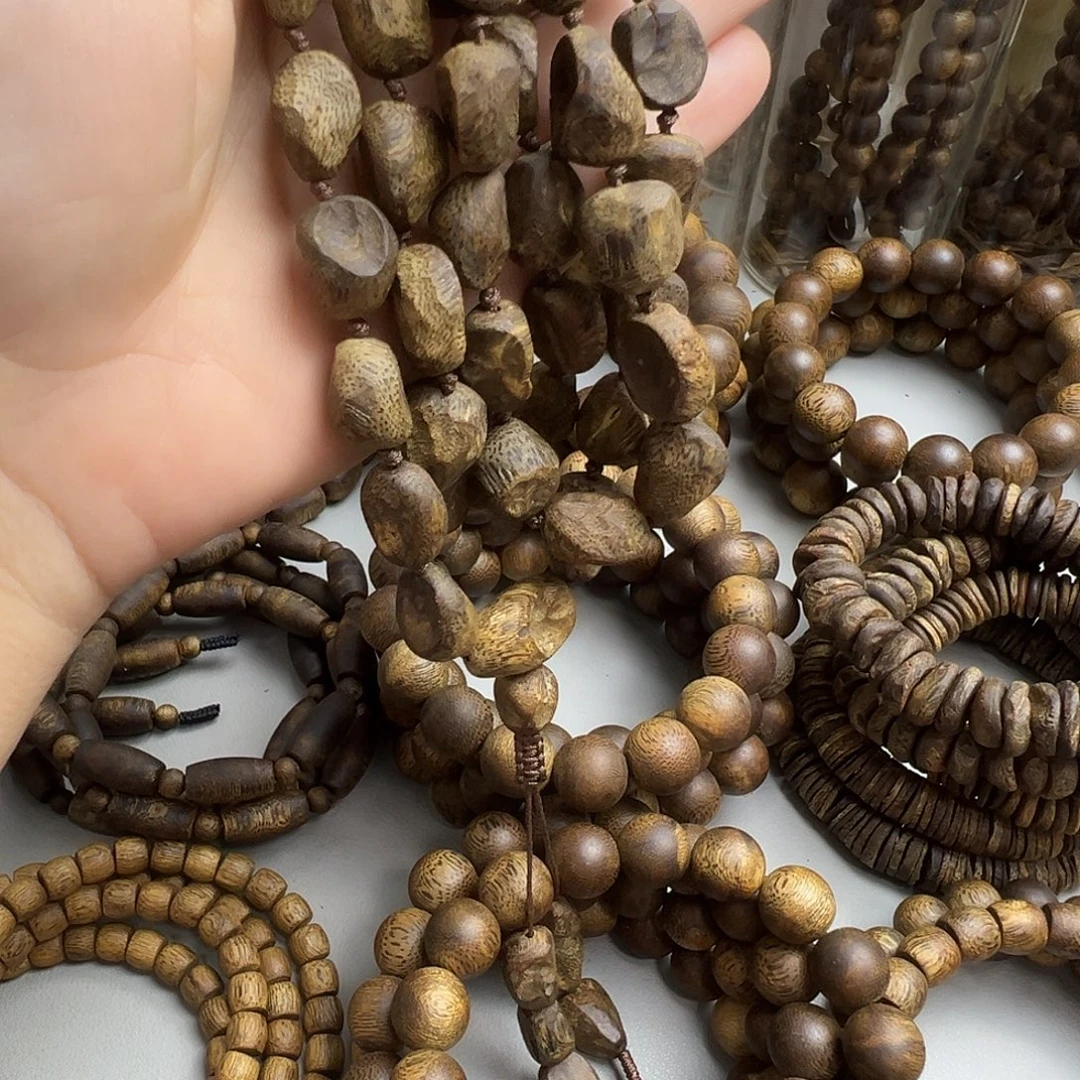 沉香碎屑沉香奇楠全沉水树丁多圈51克