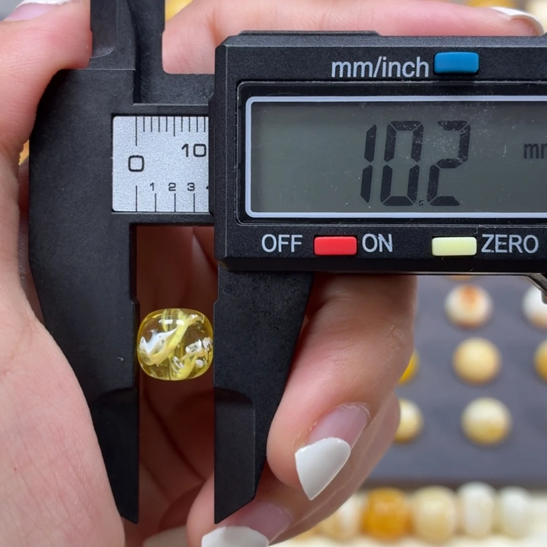 琥珀未镶嵌裸石俄料蛋花汤10.2mm