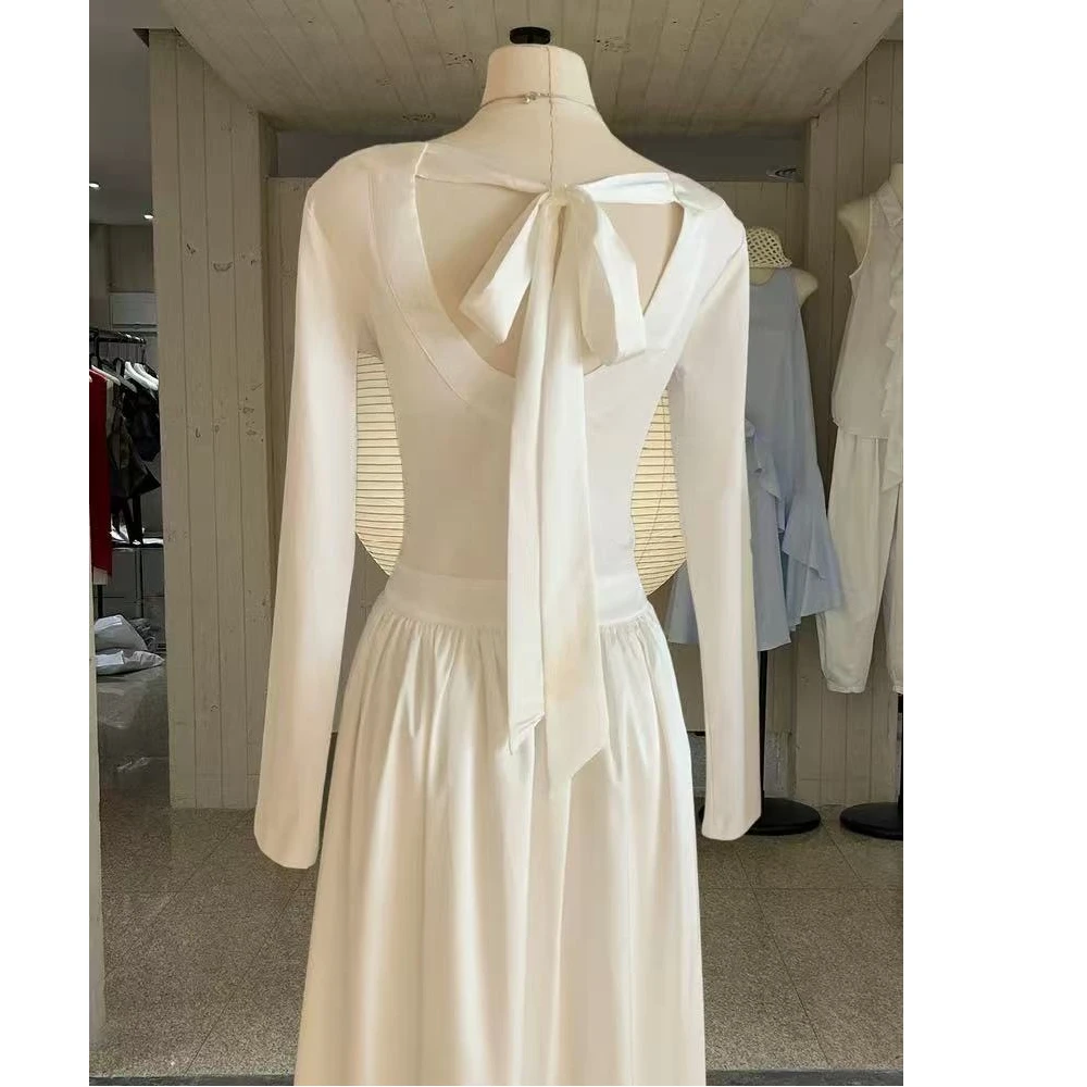 波点裙吊带新款小香系白色露背长袖短款子秋冬季法式气质收腰长裙