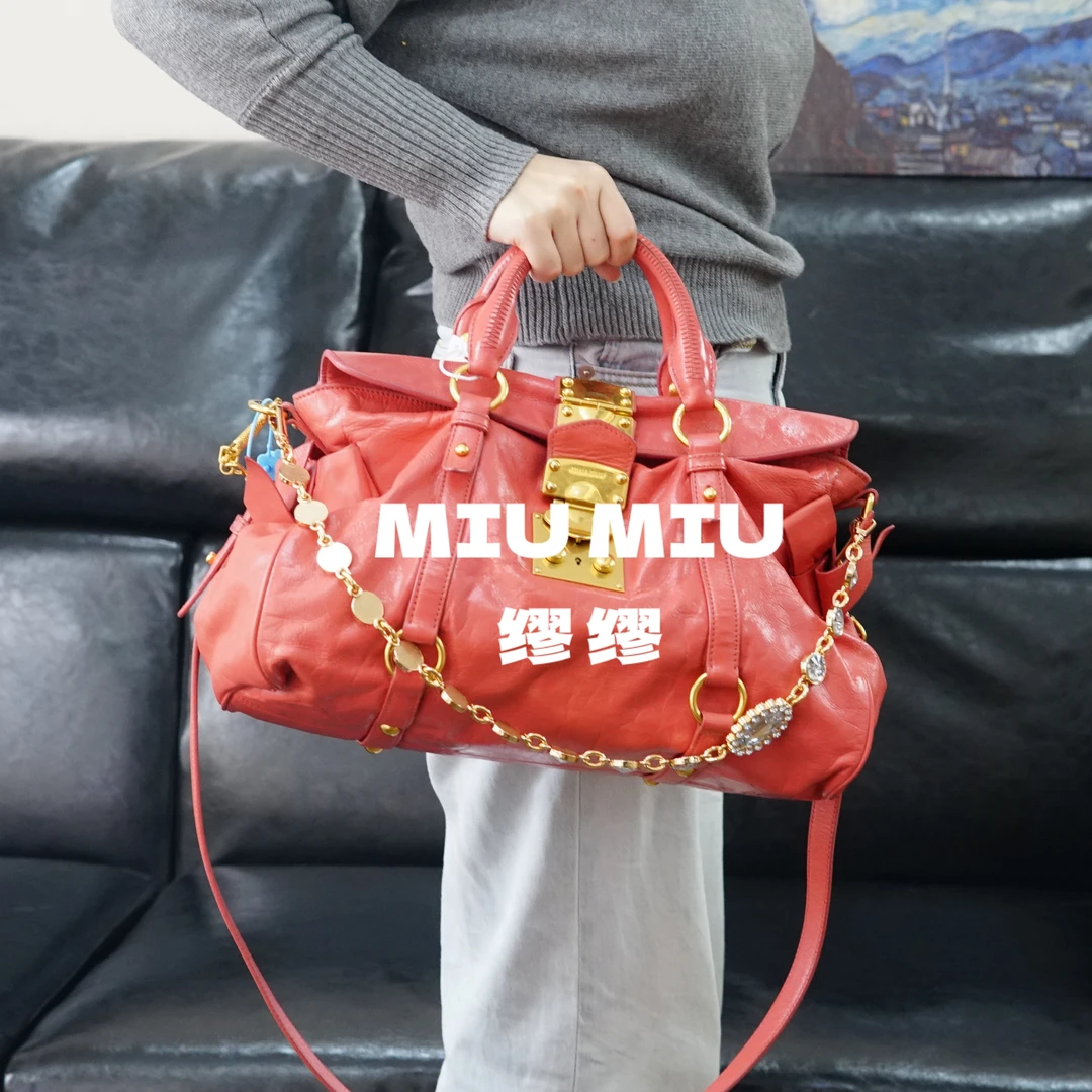 95新 MIU MIU/缪缪 miumiu/粉金斜挎包/KH12710574/0574
