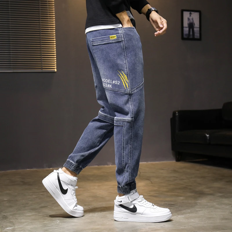 大口袋男士工装牛仔裤秋冬款宽松弹力松紧腰哈伦裤束脚九分学生裤