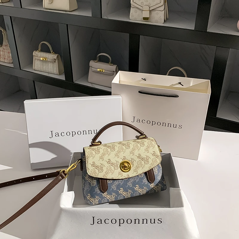 雅各邦真皮老花信封包女2025新款夏高级感轻奢小众通勤上班小拎包