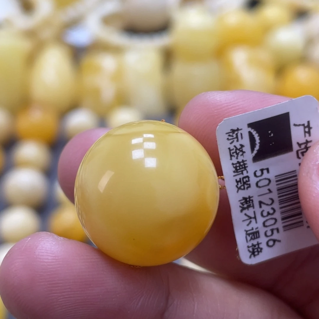 蜜蜡未镶嵌裸石20.4mm瑕疵