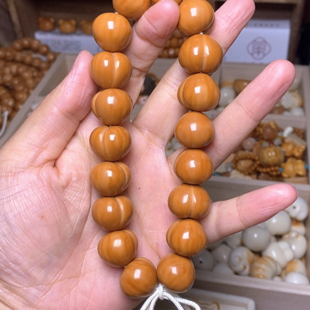 莉***目吊坠猴头核桃18.6泡芙手持