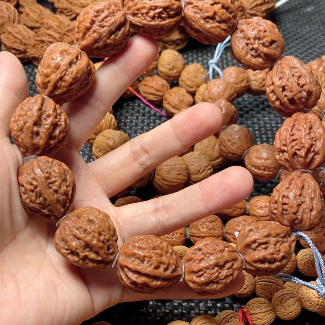 ꧔***程桃核手串蚂蚁纹手持