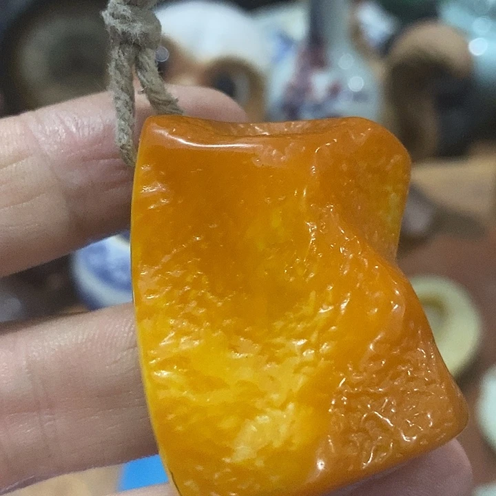 让***实手把件的重量要轻一些