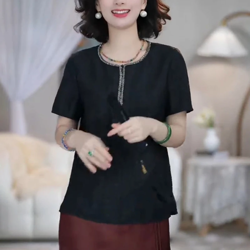 黑色洋气轻奢短袖t恤女士夏季2025新款时尚显瘦重工烫钻体恤上衣