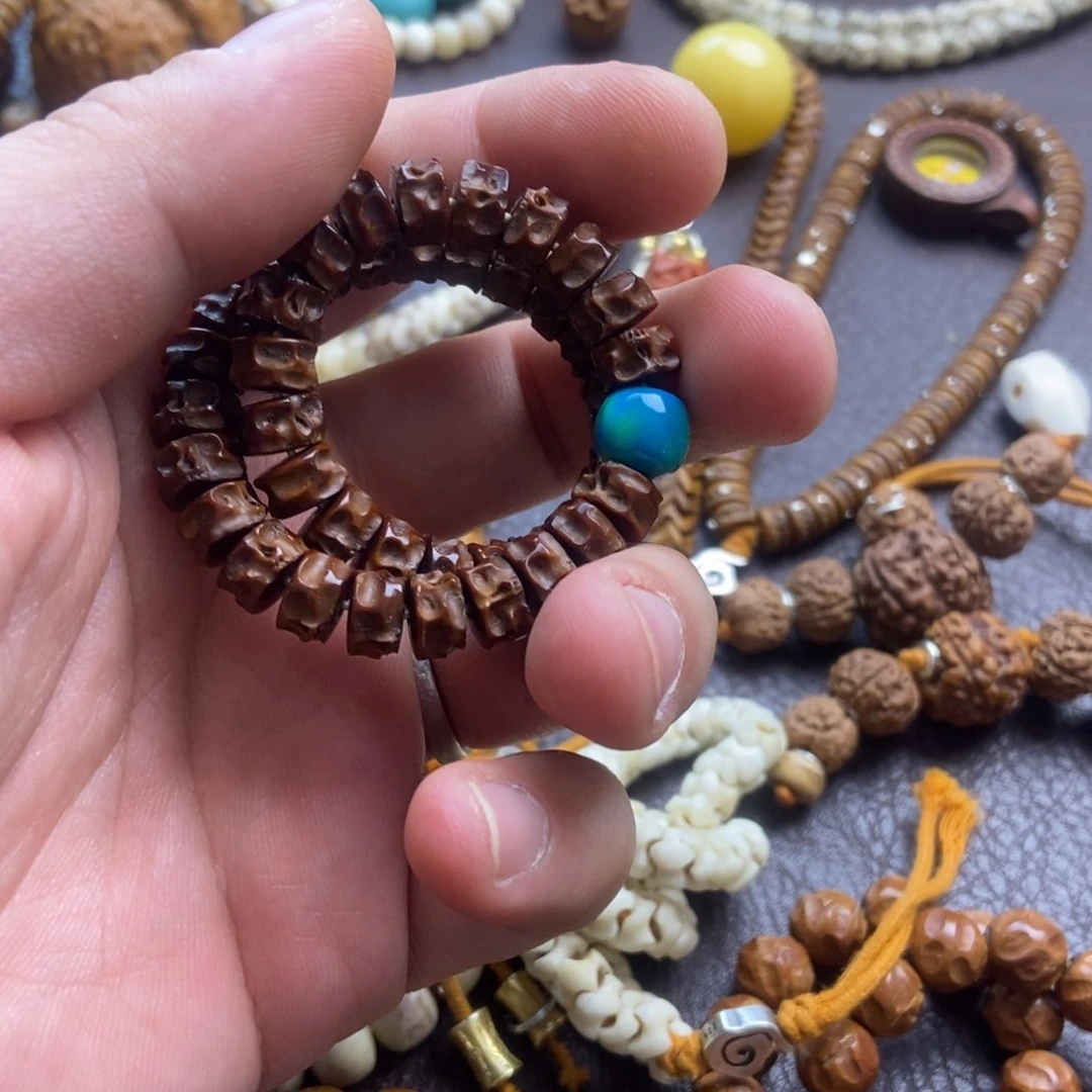 紫金鼠吊坠铁****?紫金鼠手工尸陀林手持银钉三通