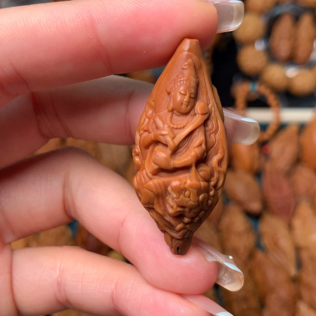 橄榄核把件文殊菩萨