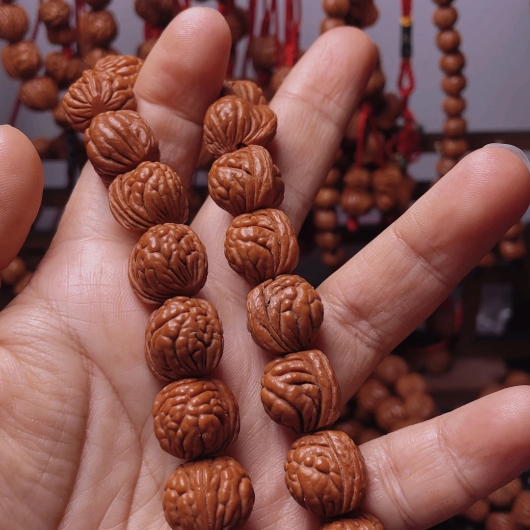 林***夕木质类龙纹桃枭手串