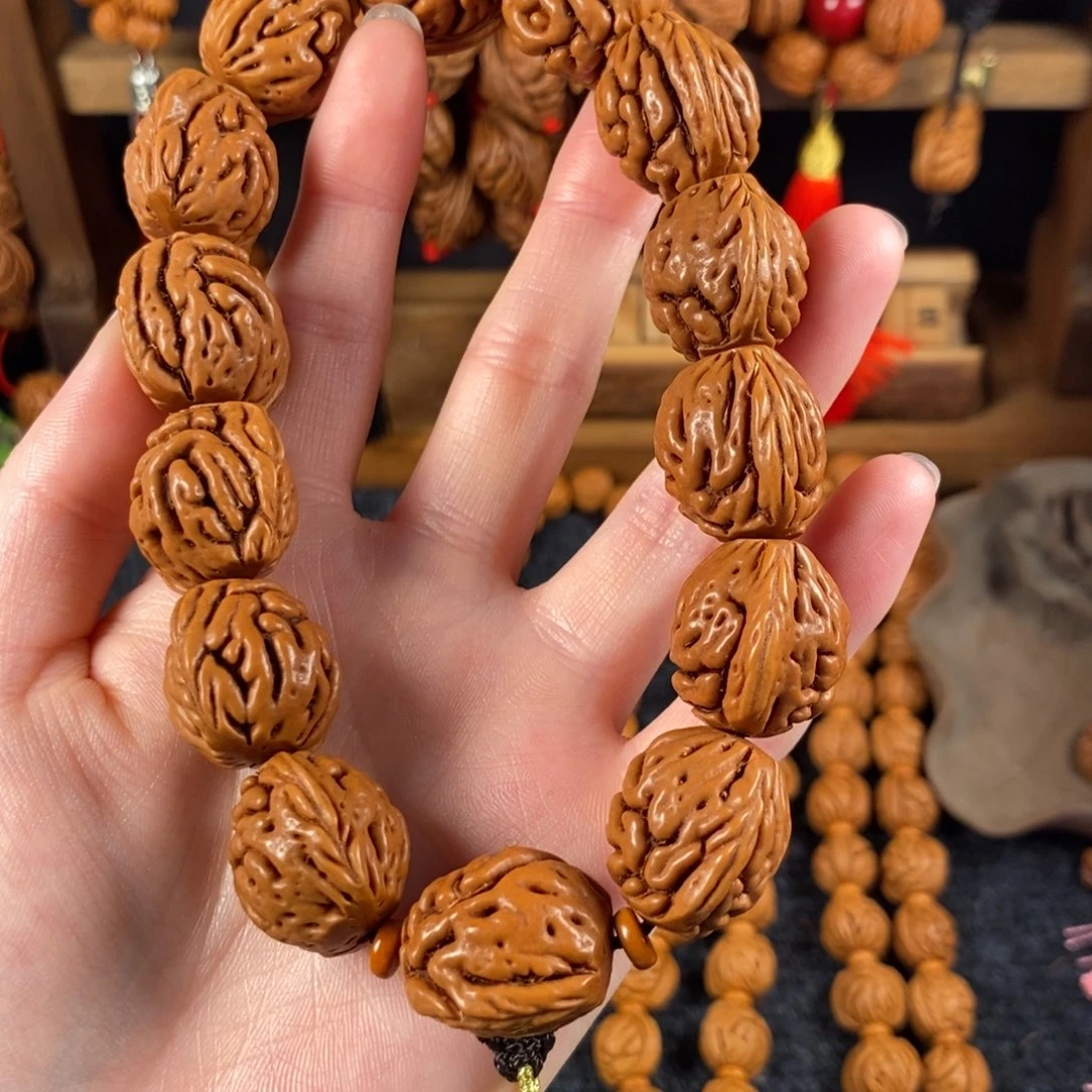 吊坠桃核初*呀桃枭手持