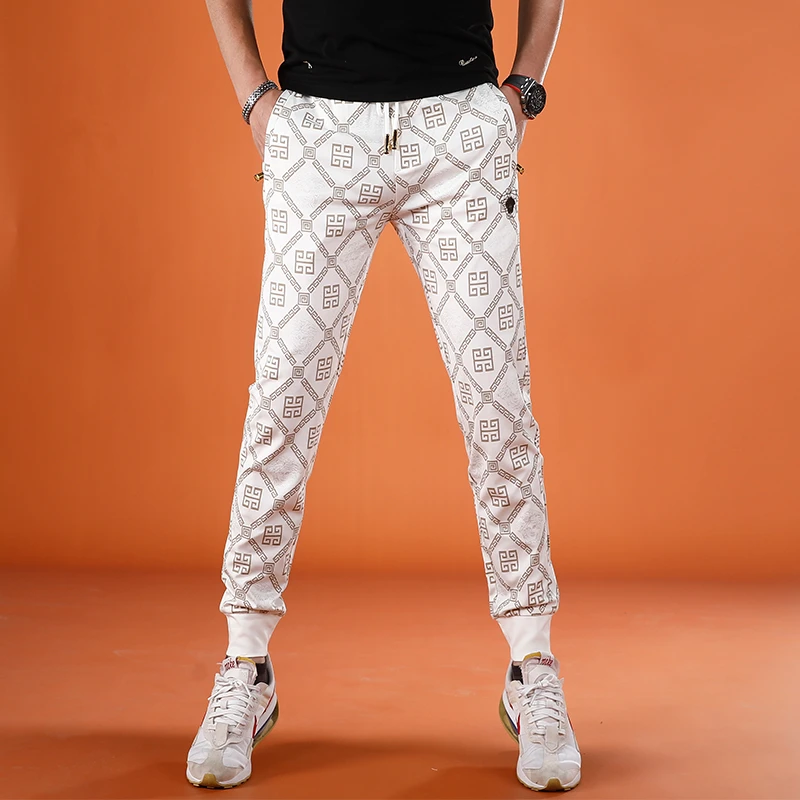 潮流白色运动裤子男夏季薄款冰丝男士休闲长裤弹力印花修身小脚裤