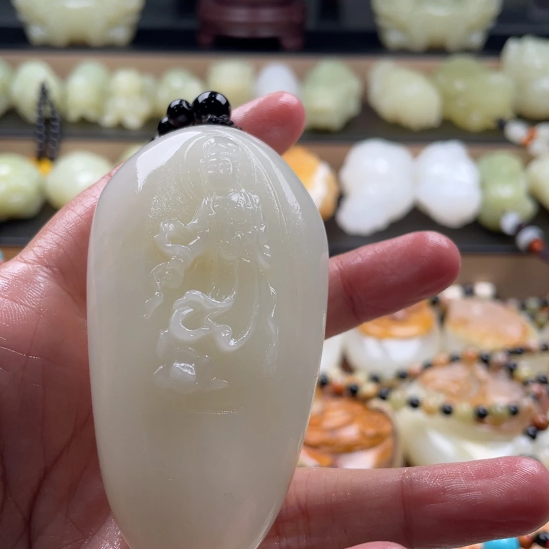 西****石材古青石手把件