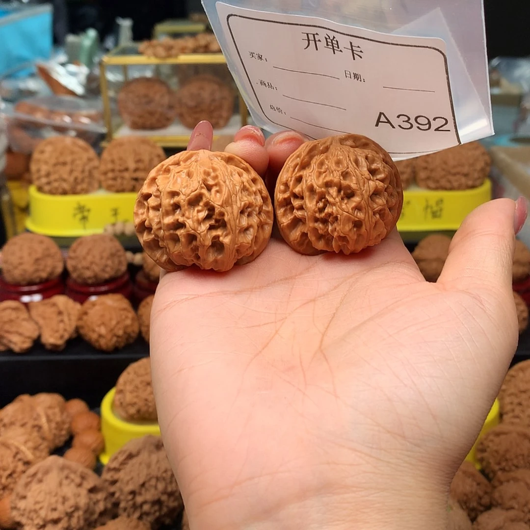 海***哥文玩核桃把件苹果园40A392