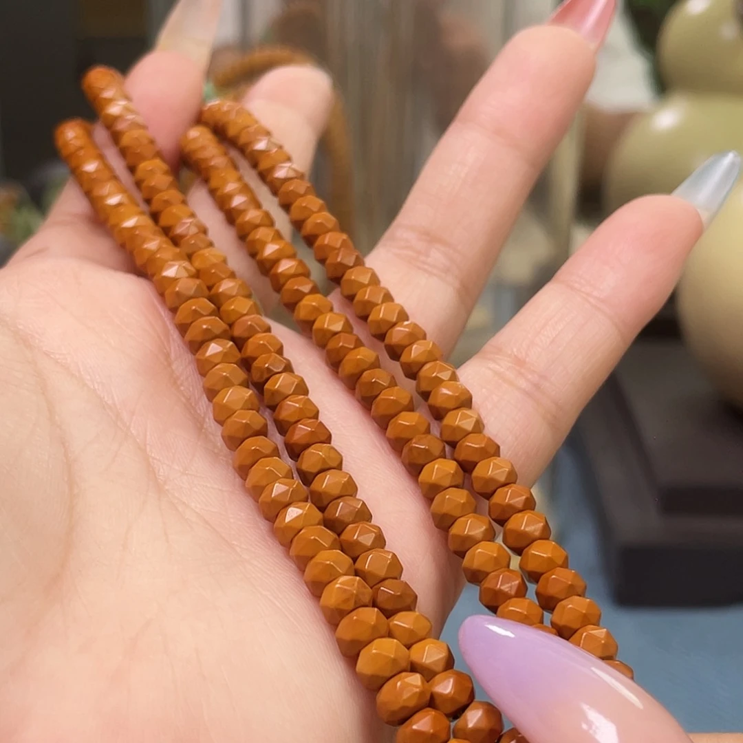 橄榄核吊坠55mm核尖脖挂钻石面