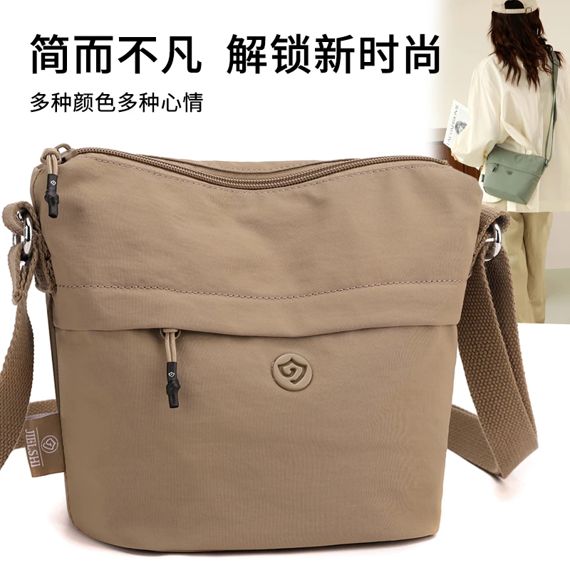 车缝线竖式休闲纯色单肩斜挎包简约防水运动竖款解锁肩包百搭