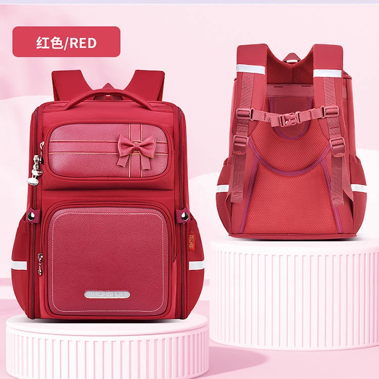 新款小学生1 - 6年级男女童减负护脊防水大容量蝴蝶结双肩背包