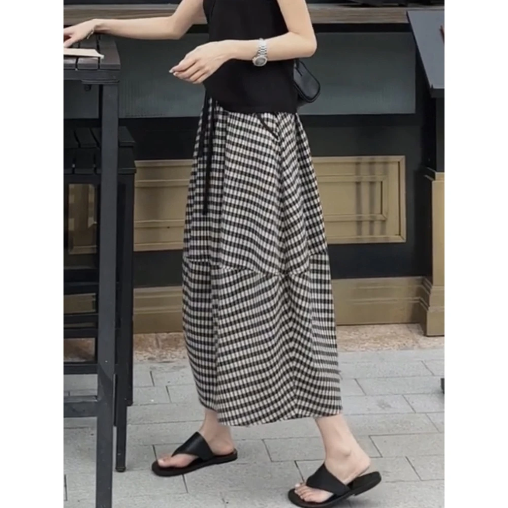 格子半身裙子女春秋季新款长裙胖mm花苞裙大码不规则
