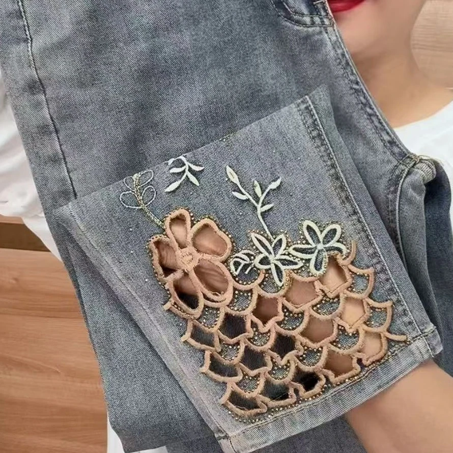 8520款重工刺绣镂空烫篆八分软牛仔烟管裤