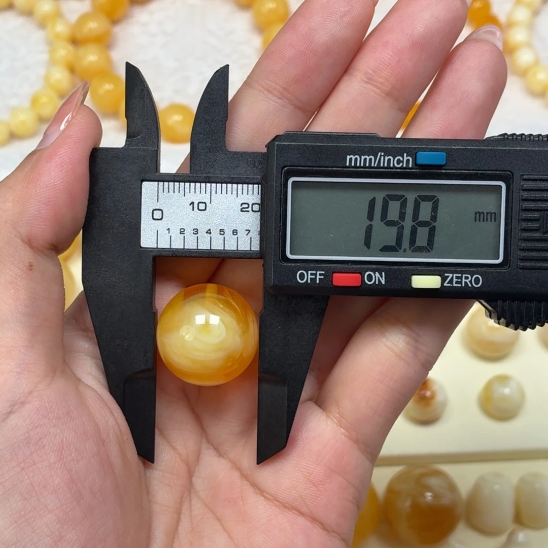 琥珀未镶嵌颈饰焦皮金橘白溶洞台风眼单珠19.8mm