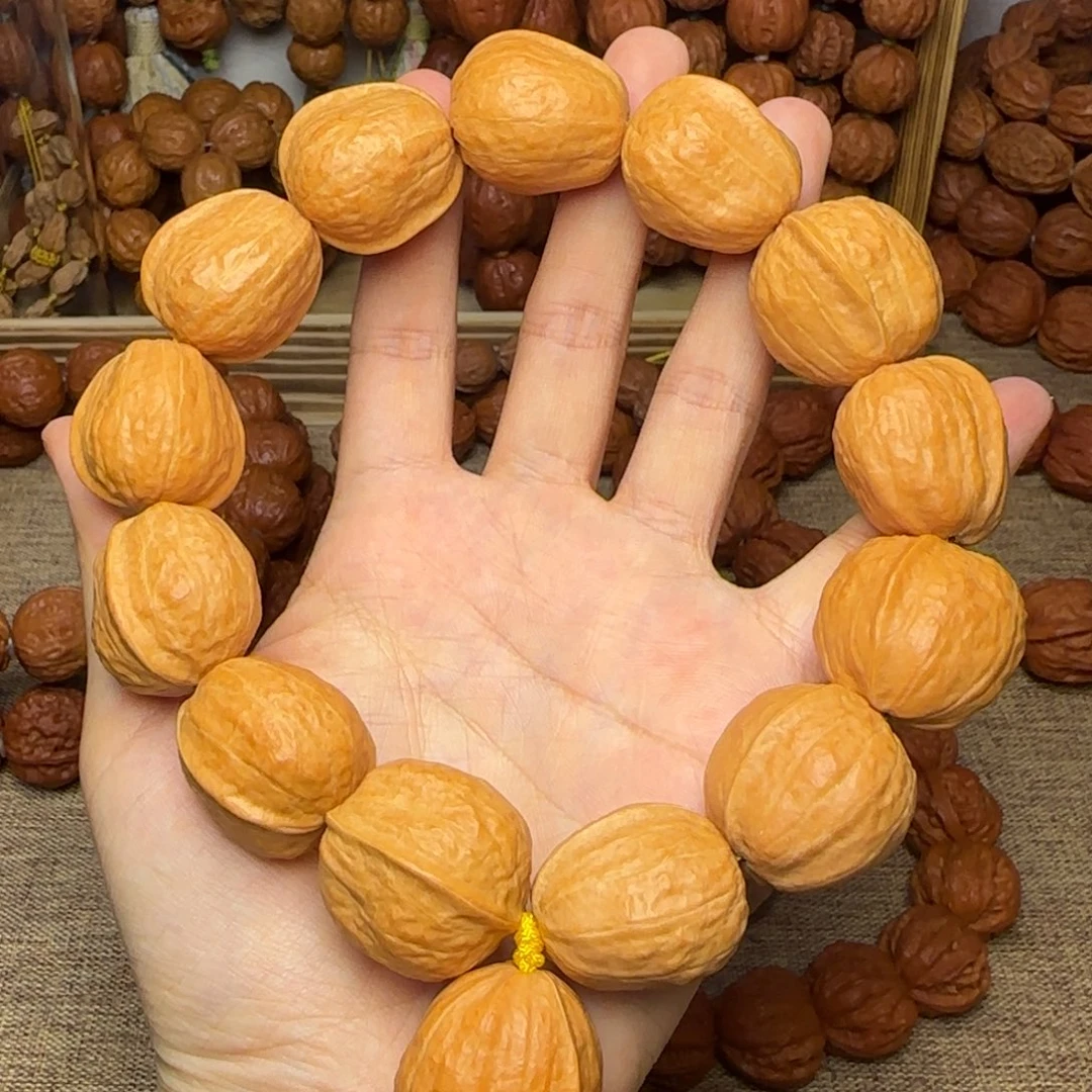 小***_文玩核桃吊坠木鱼元宝