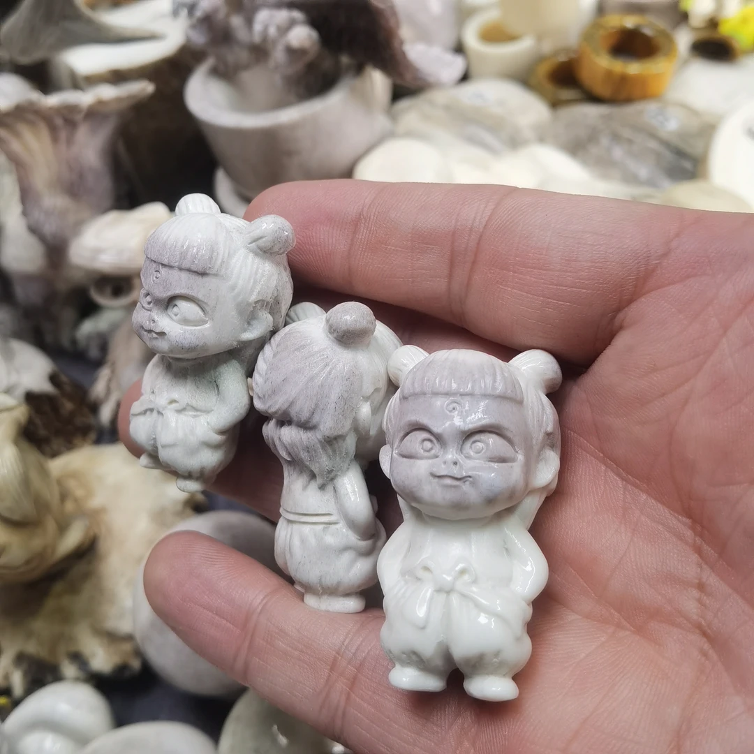 鹿角雕刻哪吒原色手把件根雕