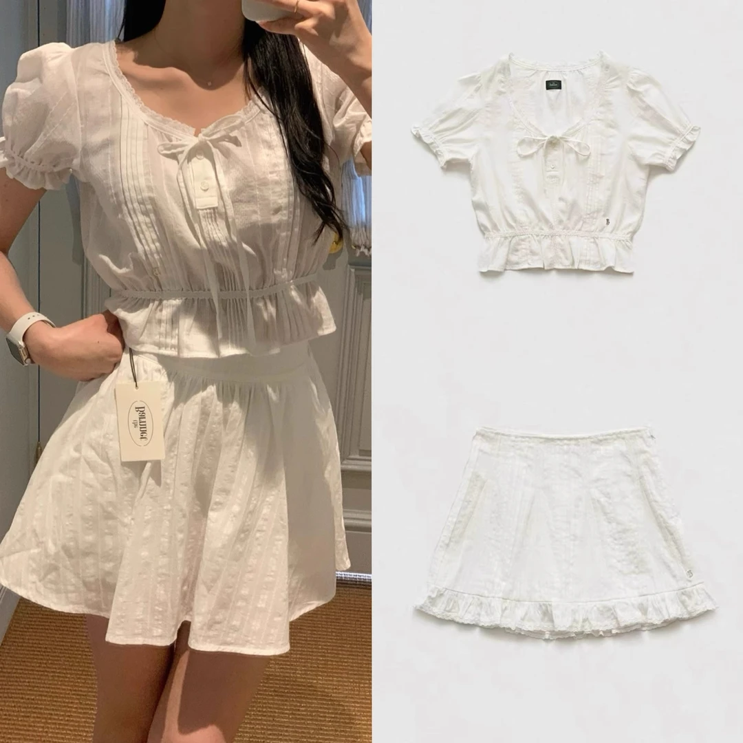 韩国东大门花边短裙女采集新款纯色打褶A字白色高腰小清新半身裙