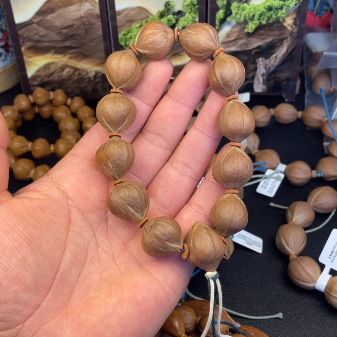 春***意橄榄核手串红肉20mm