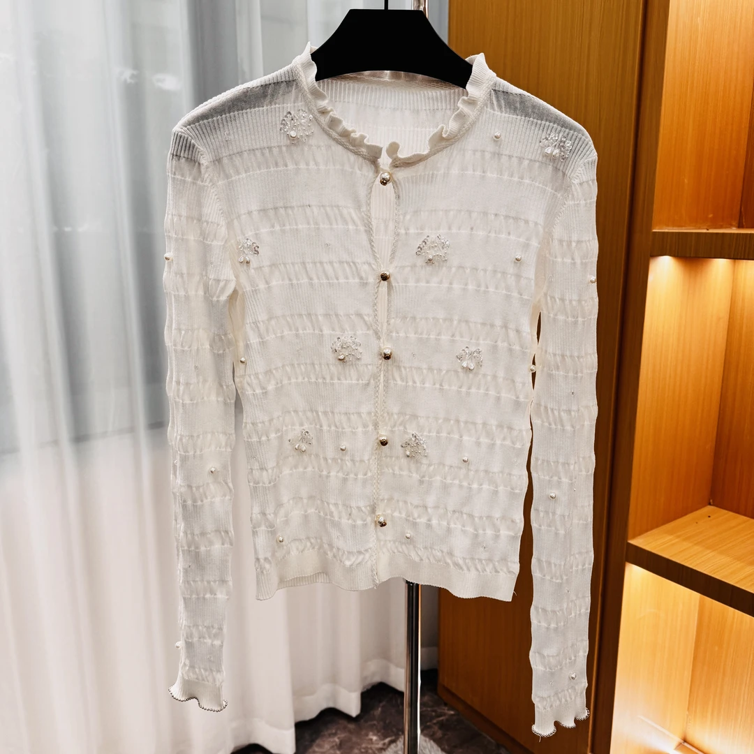 <猪猪出品>春夏上新气质白色透视设计师镂空夏季防晒针织开衫111