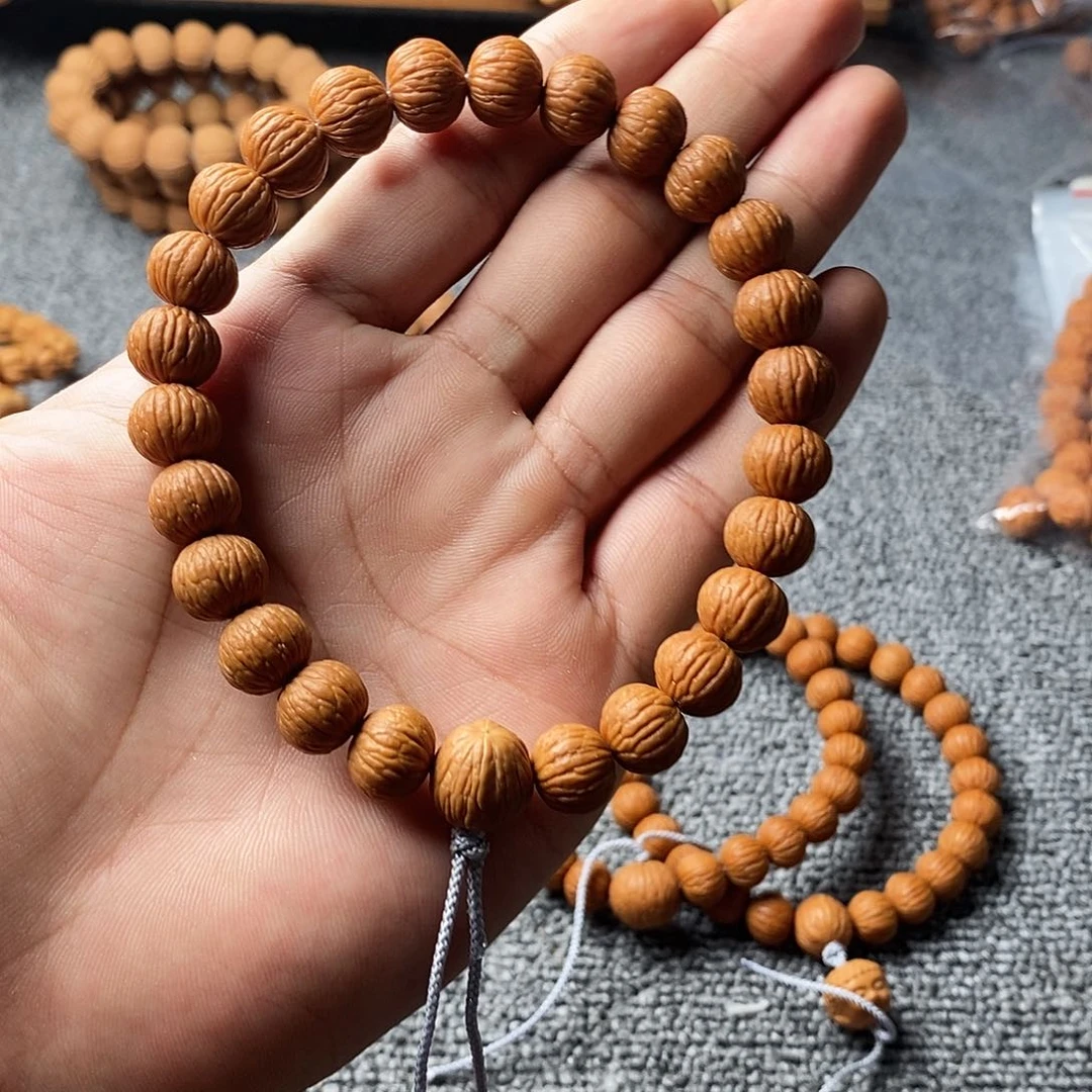 猴头核桃手串?****狼凤羽