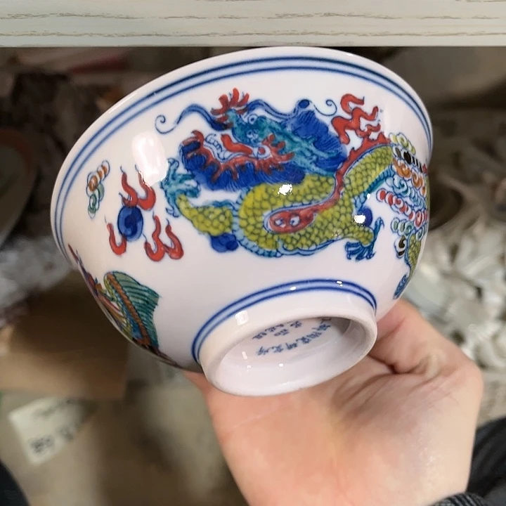 瓷片///////直径12.5厘米。红西西。