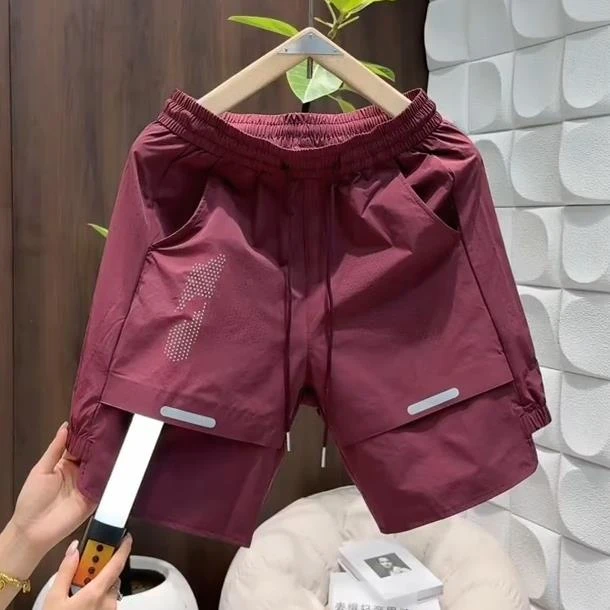 【TQUX港奢男装】夏季潮牌激光打孔拼接速干短裤男简约时尚百搭透